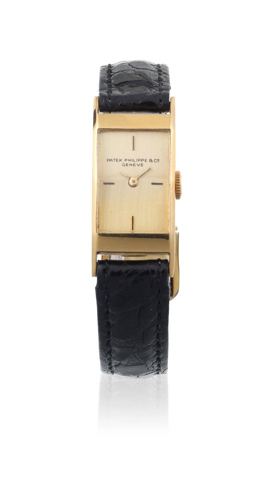 Patek Philippe Co, Geneve. A lady's 18K gold manual wind rectangular wristwatch