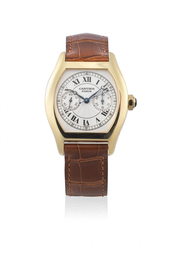Cartier. An 18K gold manual wind single button chronograph wristwatch