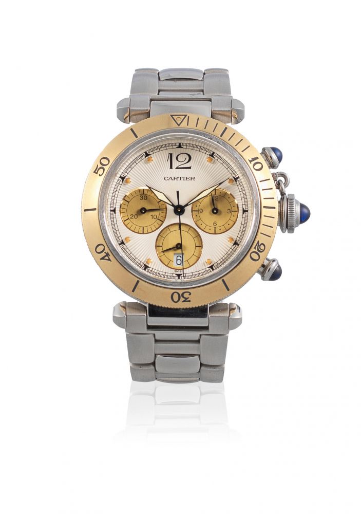 Cartier. A stainless steel and gold quartz calendar chronograph bracelet watch