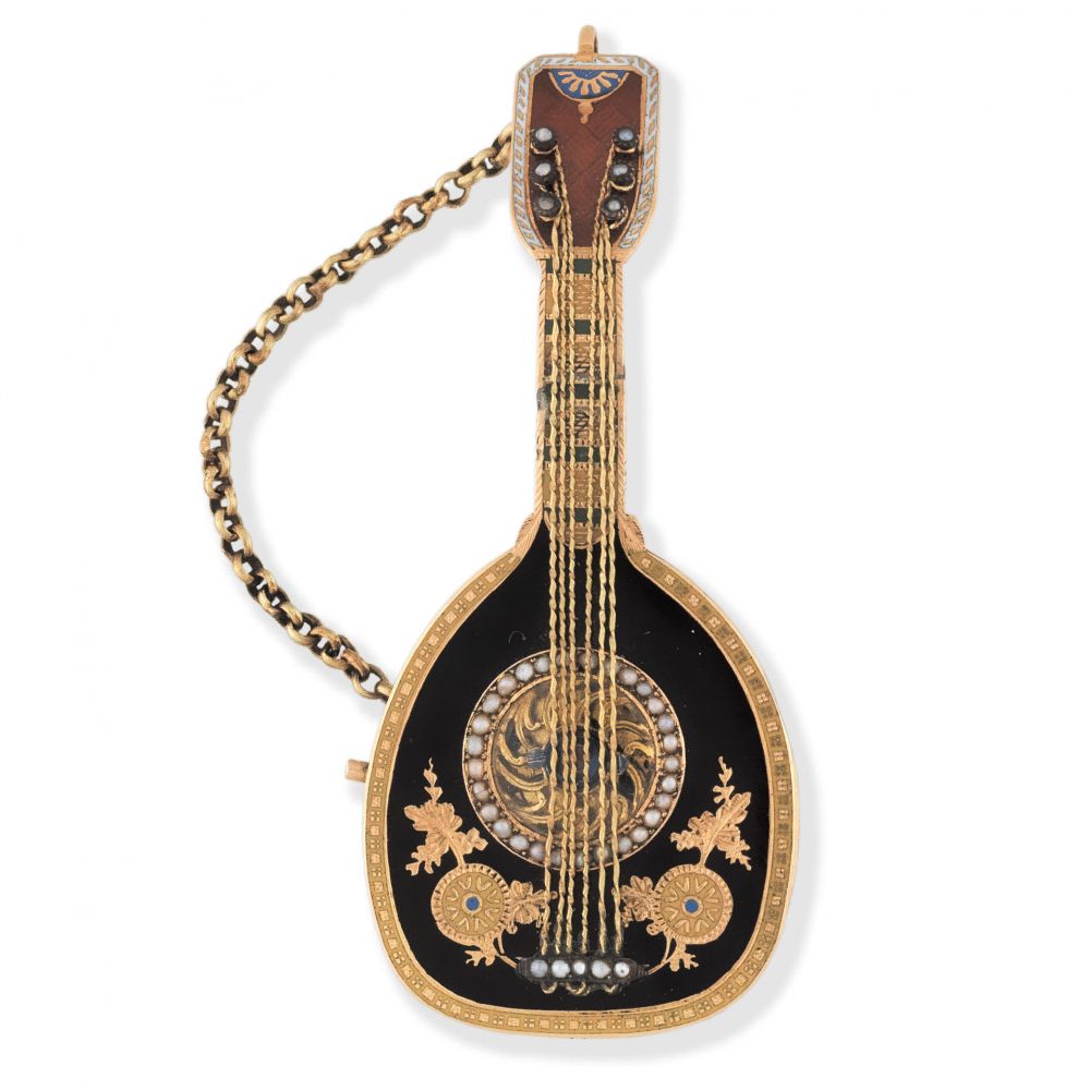 A fine and rare continental gold key wind concealed watch in the form of a mandolin with polychrome enamel decoration