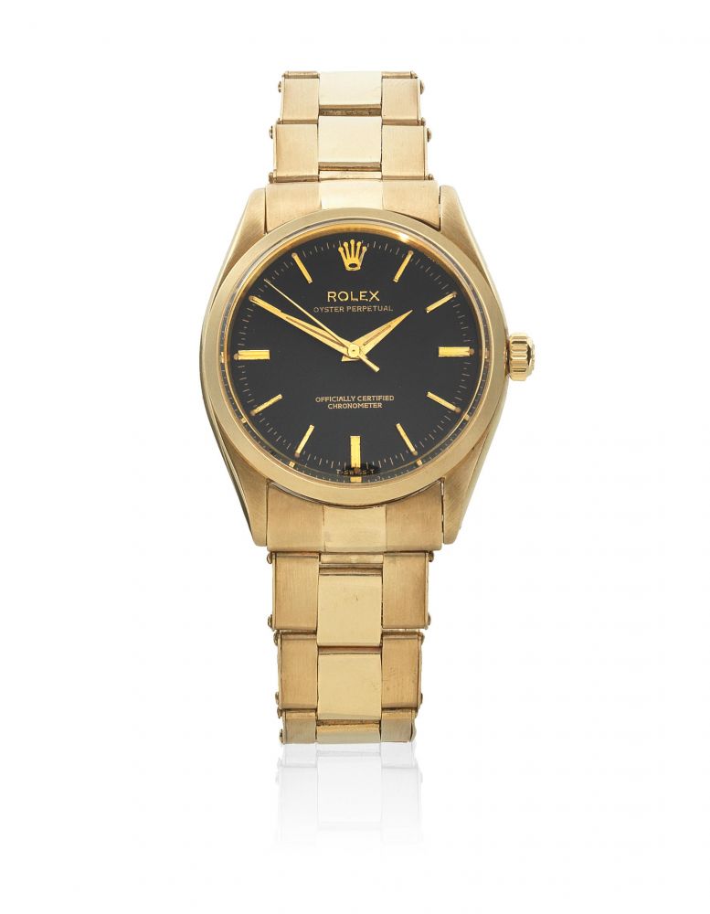 Rolex. A 9K gold automatic bracelet watch