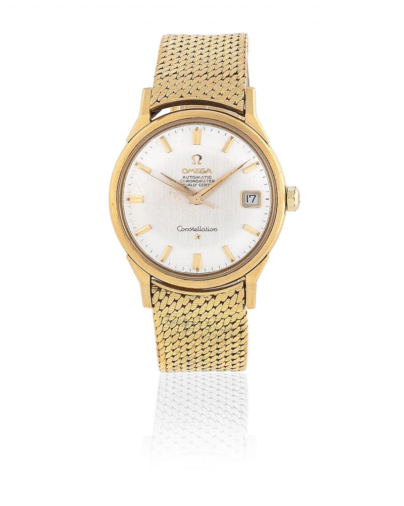 Omega. An 18K gold automatic calendar bracelet watch