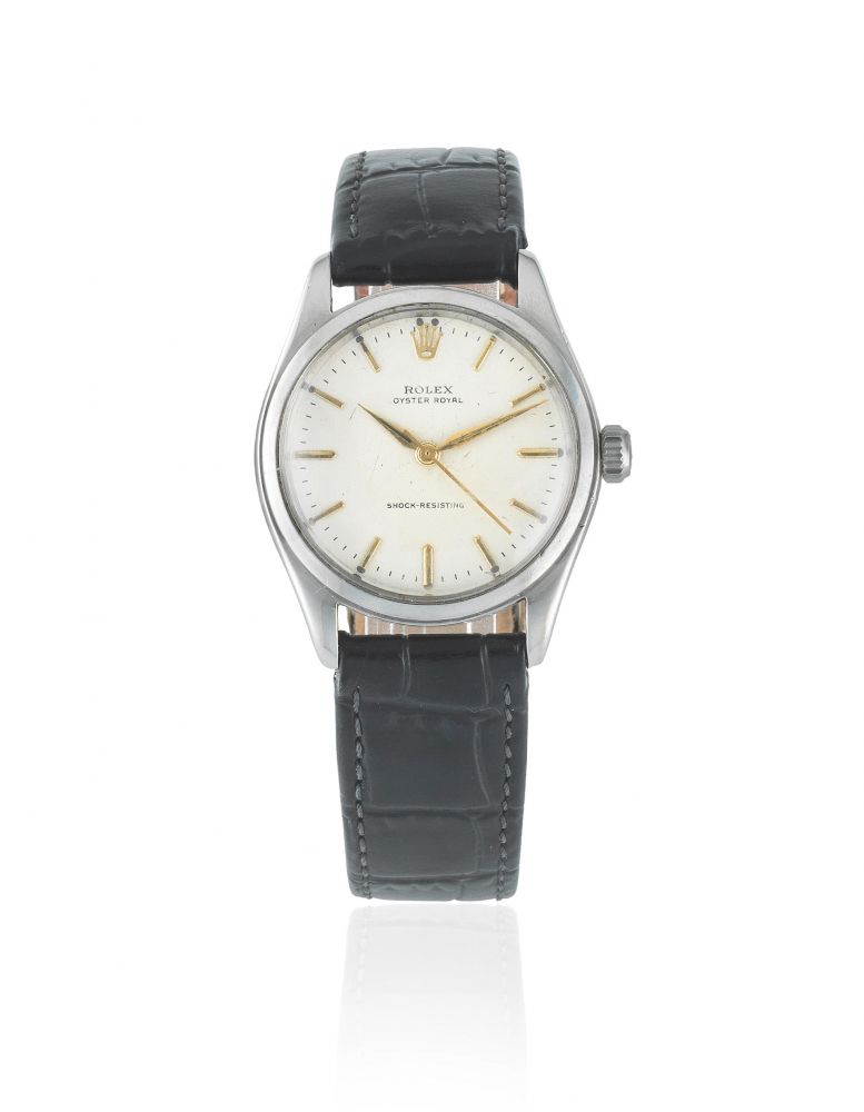 Rolex. A stainless steel manual wind wristwatch