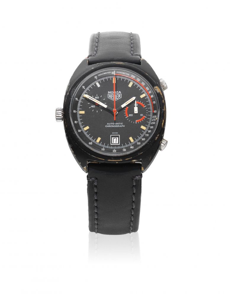 Heuer. A black stainless steel automatic calendar chronograph wristwatch