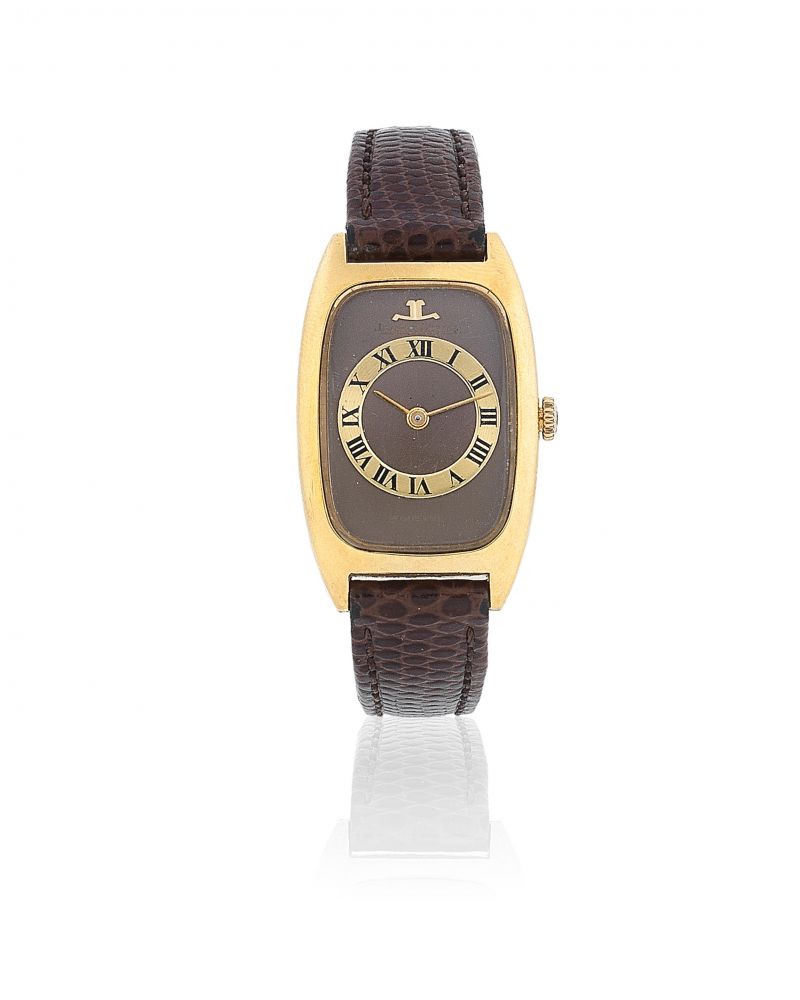 Jaeger-LeCoultre. A lady's 18K gold automatic tonneau form wristwatch