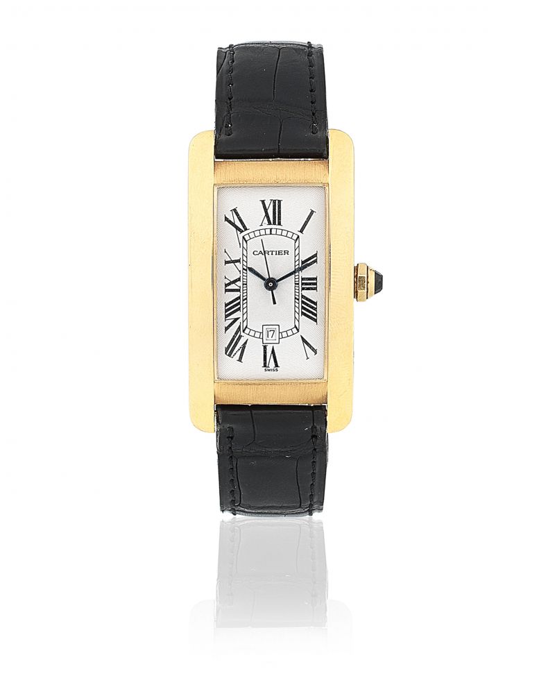 Cartier. An 18K gold automatic calendar wristwatch