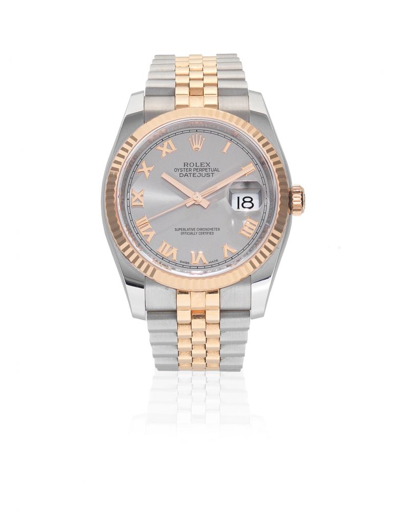 Rolex. A stainless steel and rose gold automatic calendar bracelet watch