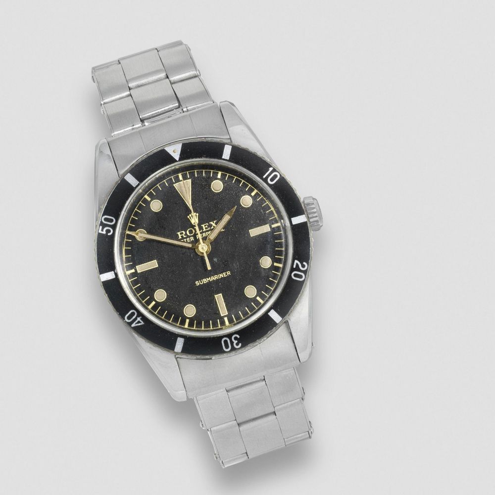 Rolex. A rare stainless steel automatic bracelet watch with 'single line' gilt dial