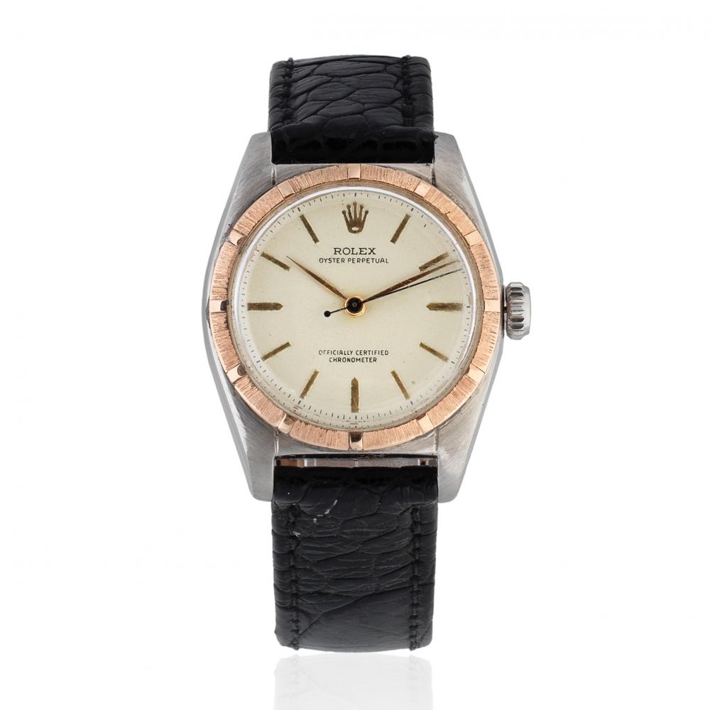 Rolex. A mid-size stainless steel and gold automatic bubbleback wristwatch