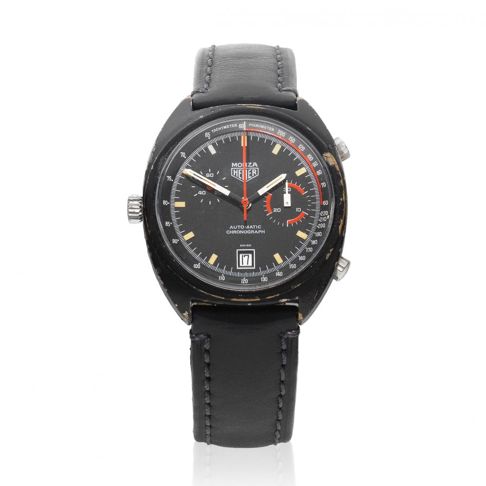 Heuer. A black stainless steel automatic calendar chronograph wristwatch