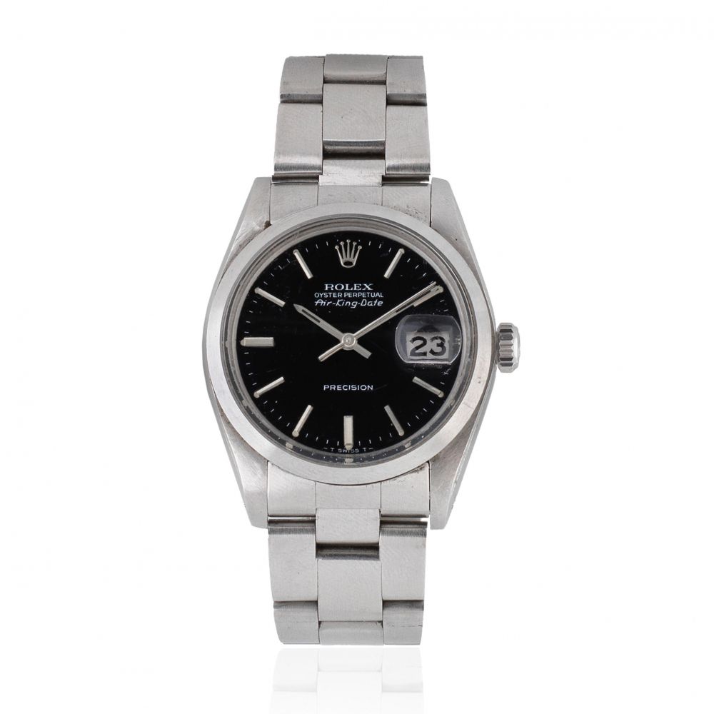 Rolex. A stainless steel automatic calendar bracelet watch