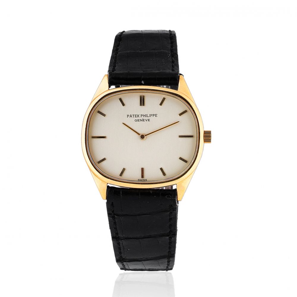 Patek Philippe. An 18K gold manual wind oval wristwatch