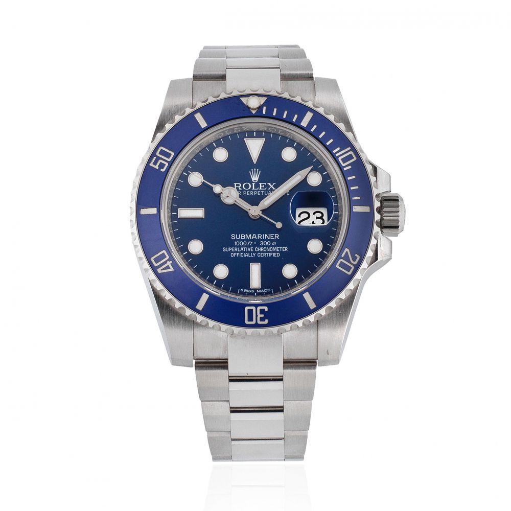 Rolex. A fine 18K white gold automatic calendar bracelet watch