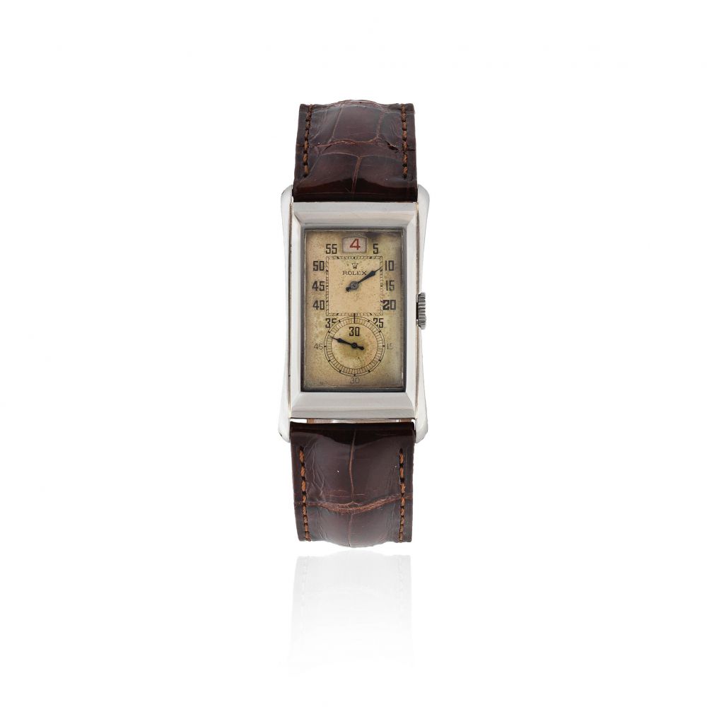 Rolex. An unusual stainless steel manual wind jump hour wristwatch