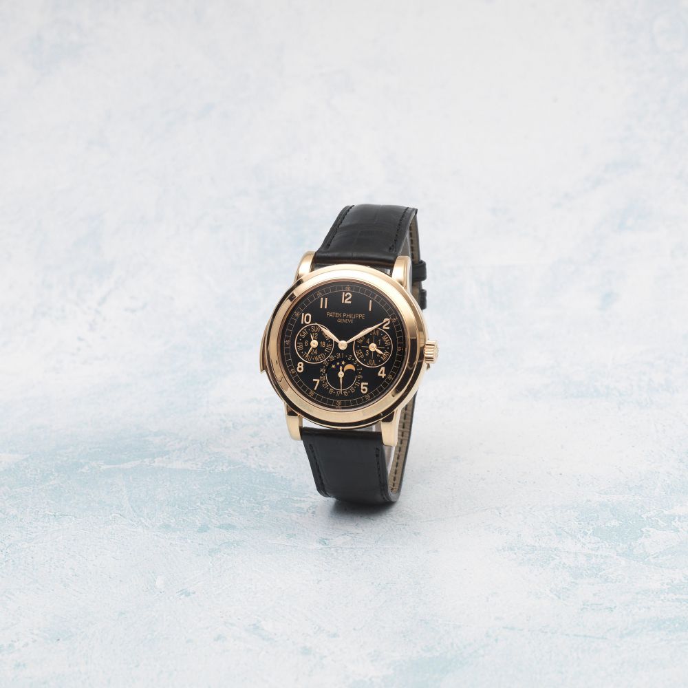 Patek Philippe. An exceptionally fine and very rare 18K rose gold automatic minute repeating perpetual calendar wristwatch with moon phase, leap year, 24-hour indication and additional solid case back
