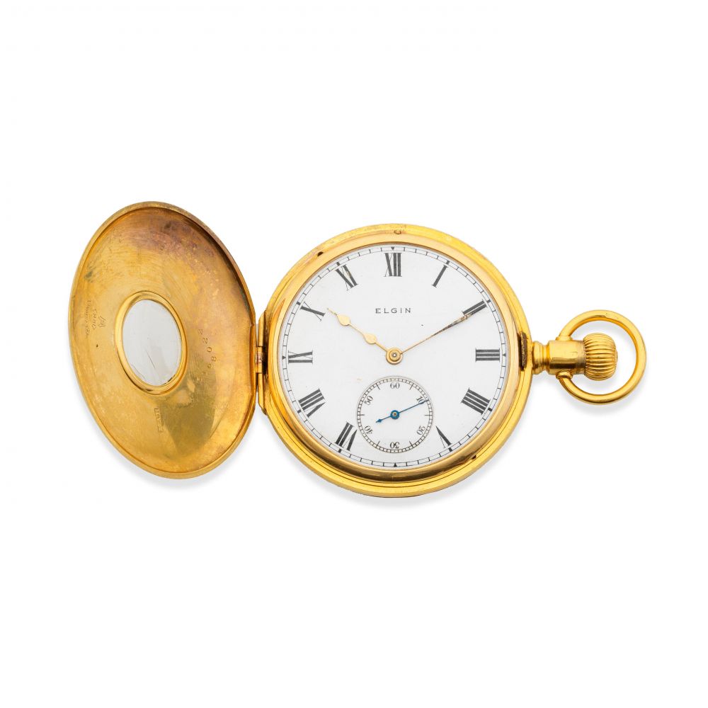 Elgin. An 18K gold keyless wind half hunter pocket watch