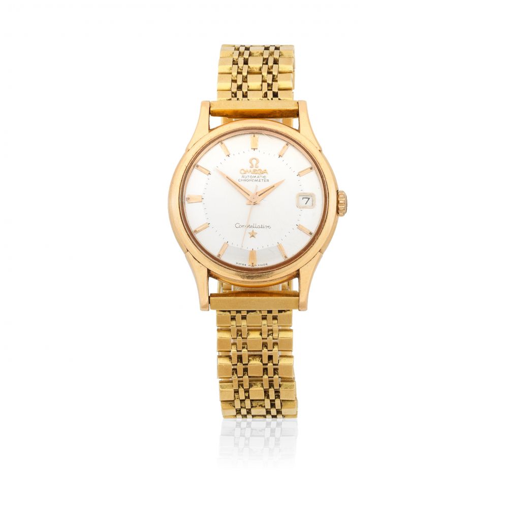 Omega. An 18K gold automatic calendar bracelet watch with pie-pan dial