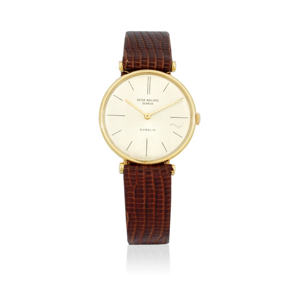 Patek Philippe. An 18K gold manual wind wristwatch Retailed by Gübelin