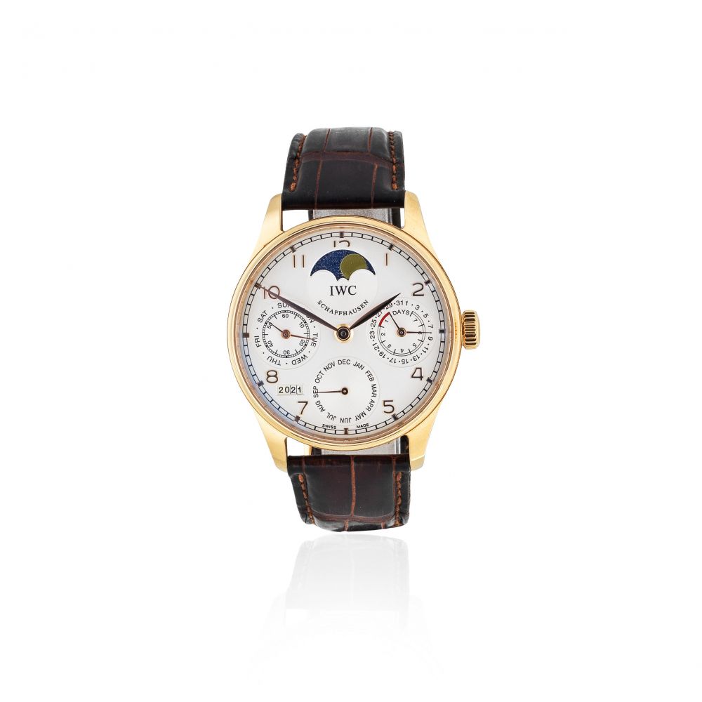 IWC. An 18K rose gold automatic perpetual calendar wristwatch with moon phase and 7 day power reserve