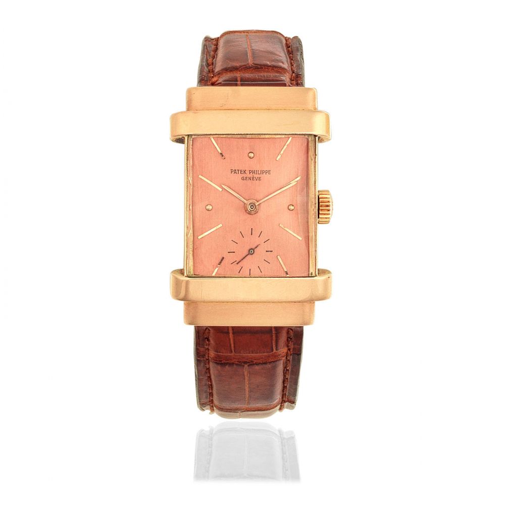Patek Philippe. An 18K rose gold manual wind rectangular wristwatch with hooded lugs