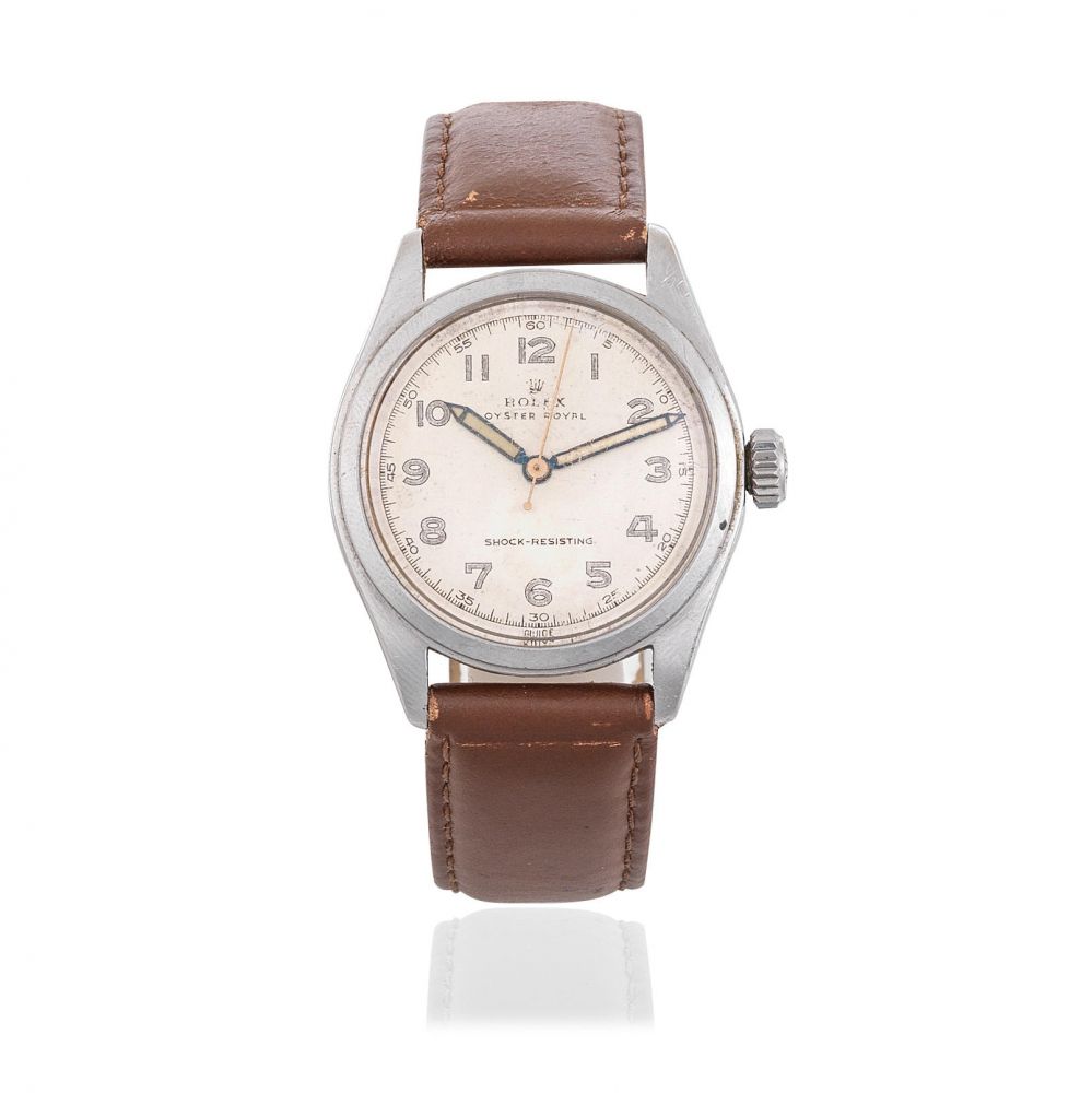 Rolex. A stainless steel manual wind wristwatch