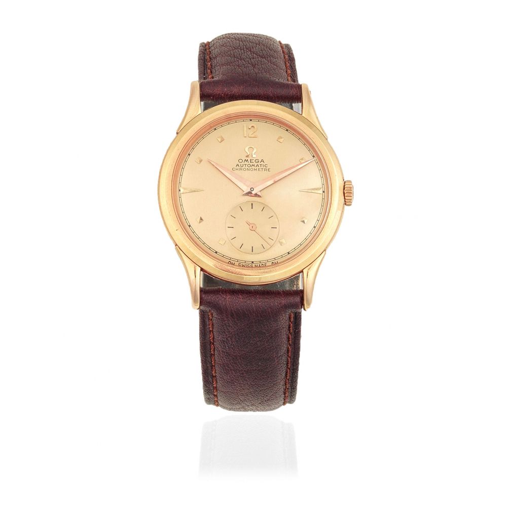 Omega. An 18K rose gold bumper automatic wristwatch
