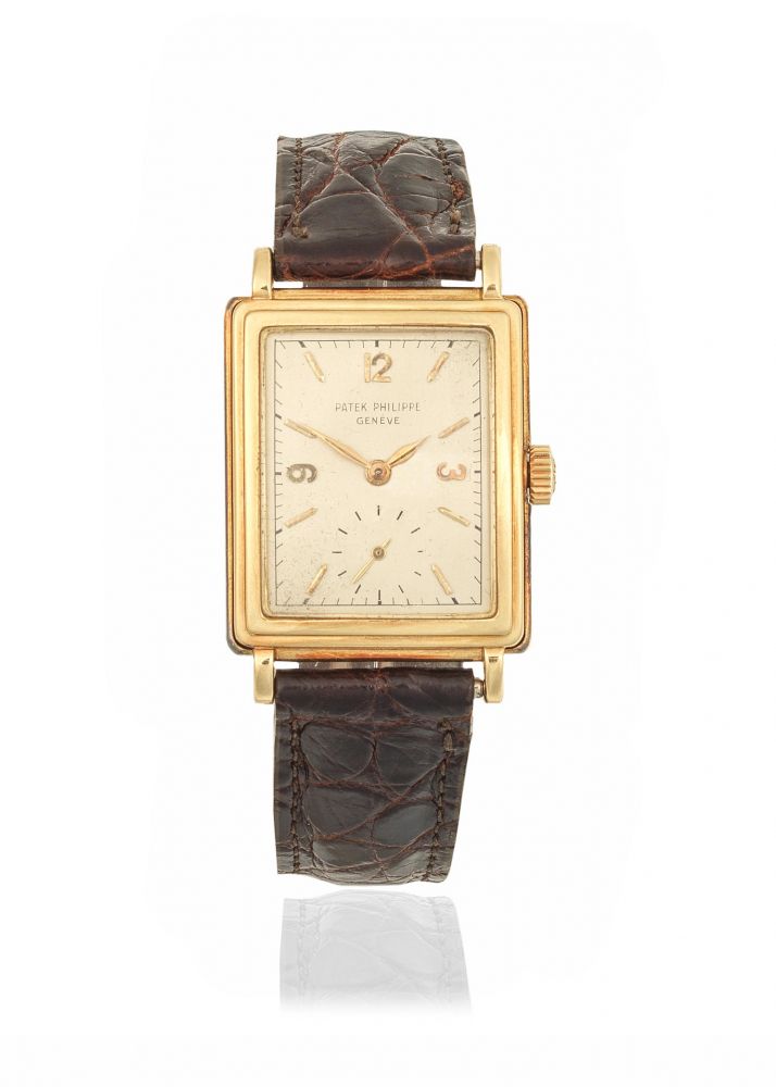 Patek Philippe. An 18K gold manual wind rectangular wristwatch