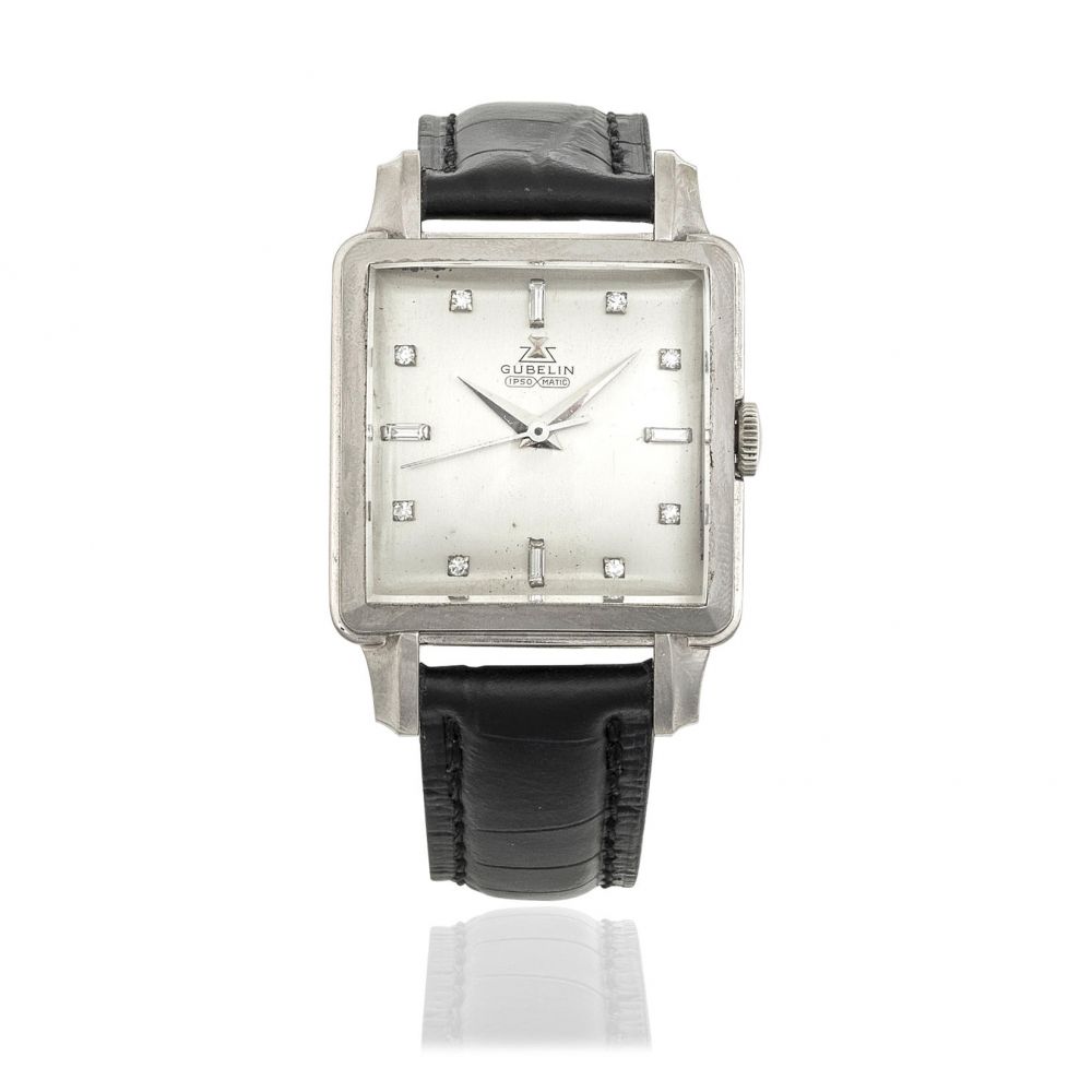 Gübelin. An 18K white gold and diamond set automatic wristwatch