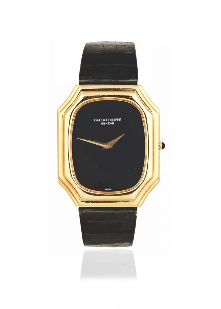 Patek Philippe. An 18K gold manual wind wristwatch with onyx dial