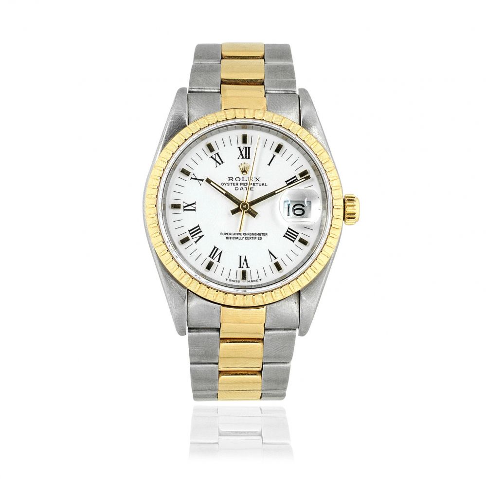 Rolex. A stainless steel and gold automatic calendar bracelet watch