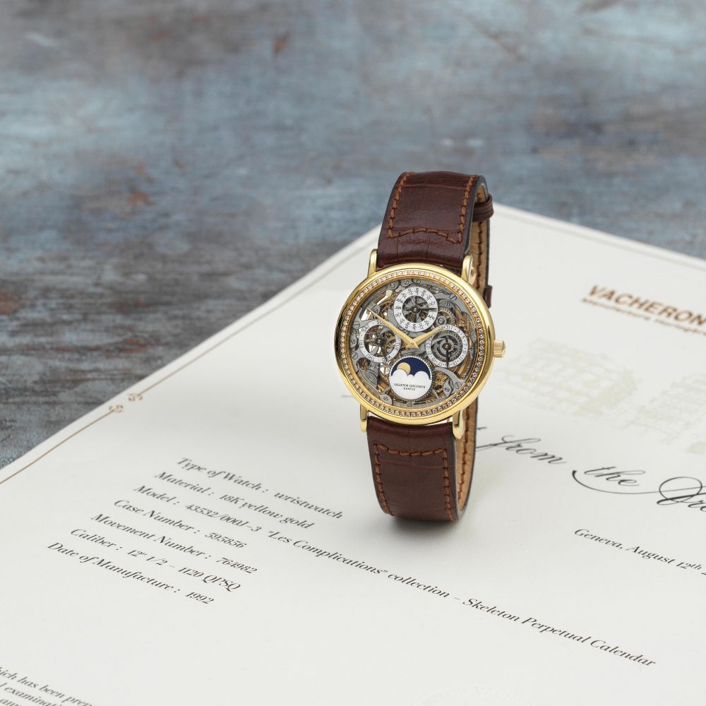 Vacheron Constantin. A fine 18K gold and diamond set automatic perpetual calendar skeletonised wristwatch