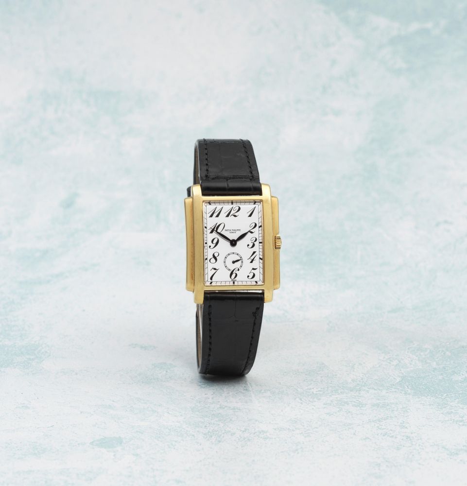 Patek Philippe. An 18K gold manual wind rectangular wristwatch