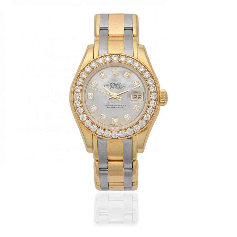 Rolex. A lady's 18K two colour gold and diamond set automatic calendar bracelet watch with diamond set mother of pearl dial
