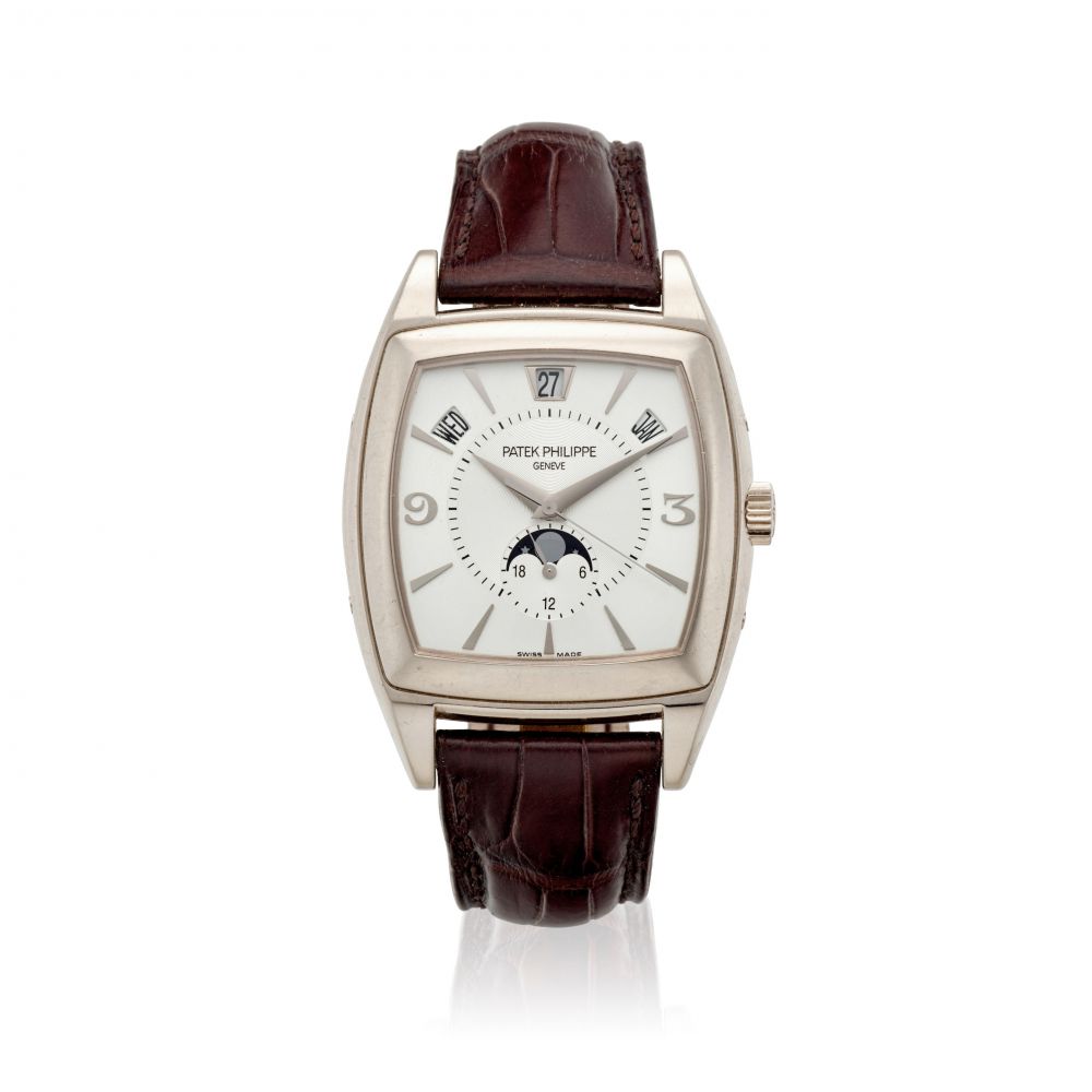 PATEK PHILIPPE. A FINE 18K WHITE GOLD AUTOMATIC TRIPLE CALENDAR WRISTWATCH WITH MOON PHASE