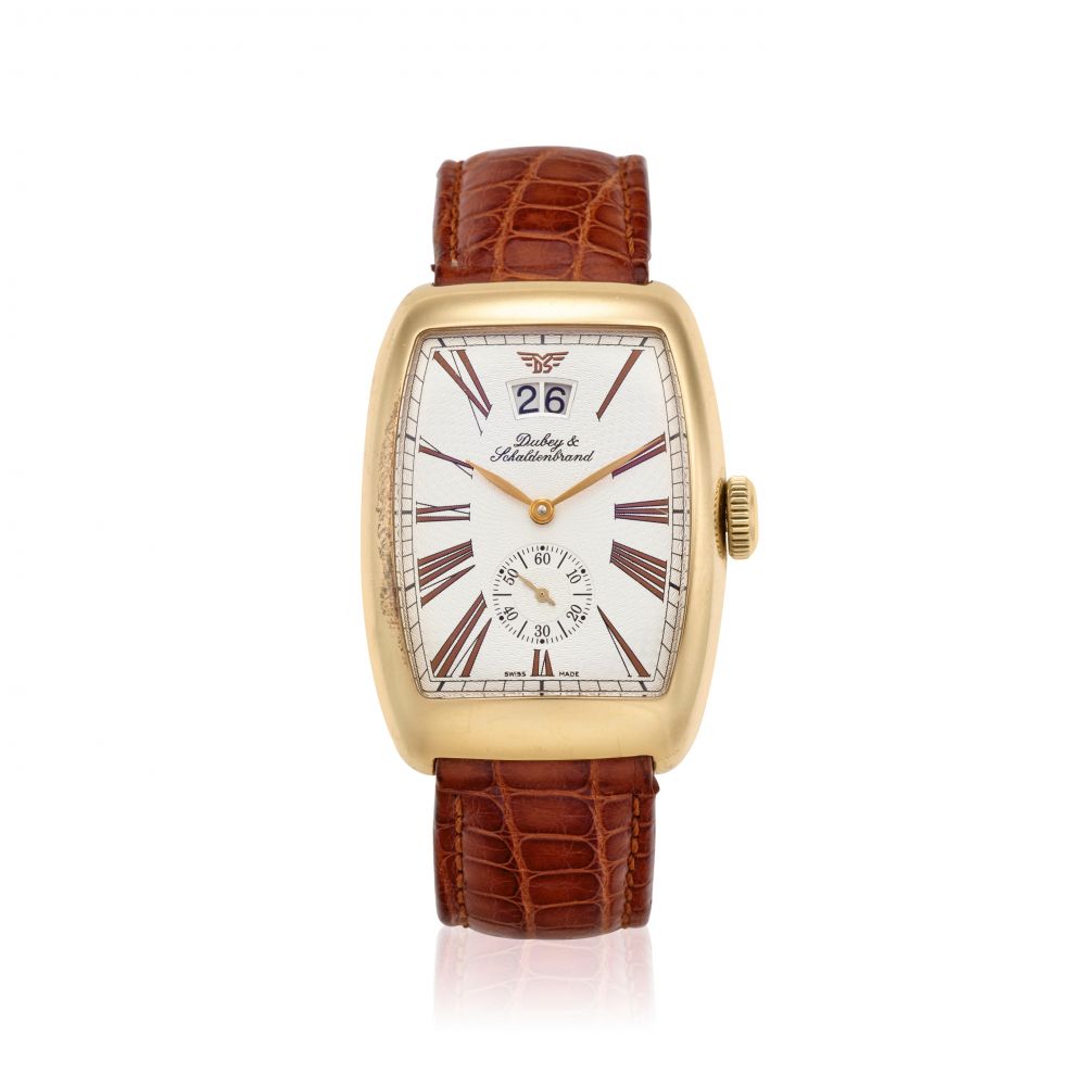 DUBEY AND SCHALDENBRAND. AN 18K GOLD AUTOMATIC CALENDAR WRISTWATCH
