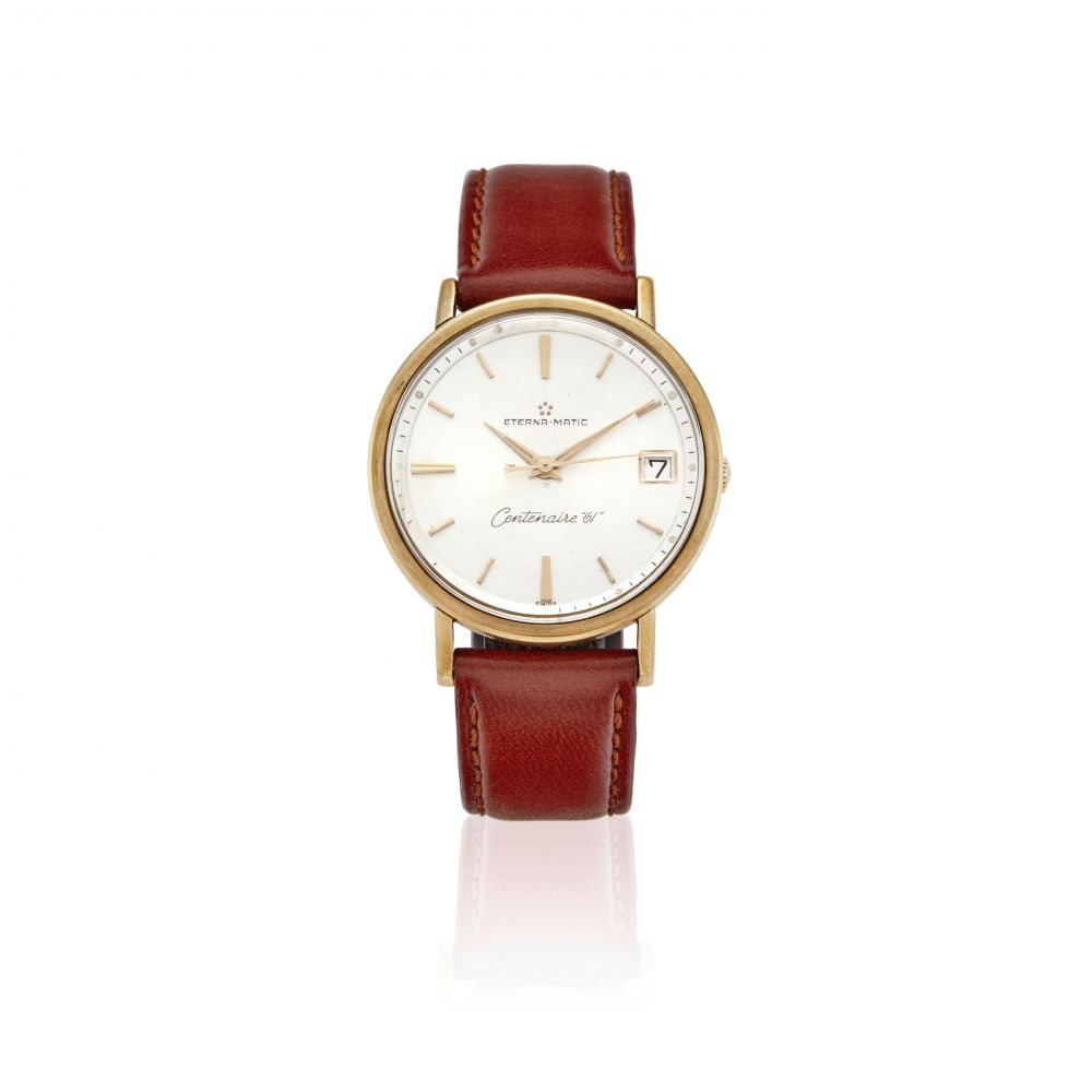 ETERNAMATIC. AN 18K GOLD AUTOMATIC CALENDAR WATCH