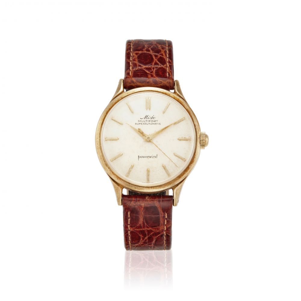 MIDO. A 14K GOLD AUTOMATIC WRISTWATCH