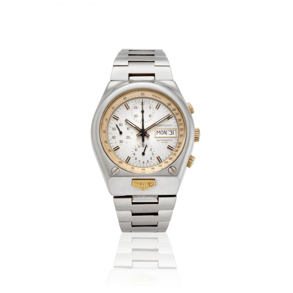 HEUER. A STAINLESS STEEL AUTOMATIC CALENDAR CHRONOGRAPH BRACELET WATCH