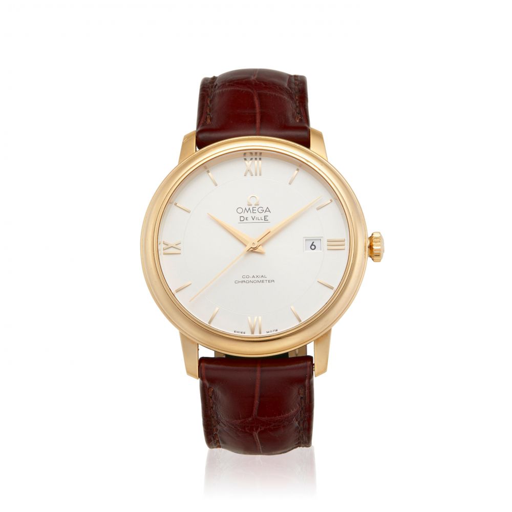 OMEGA. AN 18 GOLD AUTOMATIC CALENDAR WRISTWATCH