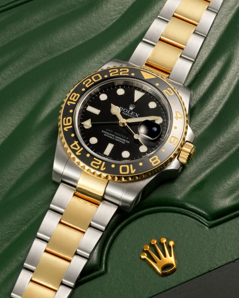 ROLEX | REF. 116713LN GMT-MASTER II, A FINE YELLOW GOLD AND STAINLESS STEEL DUAL TIME BRACELET WATCH WITH DATE, CIRCA 2008