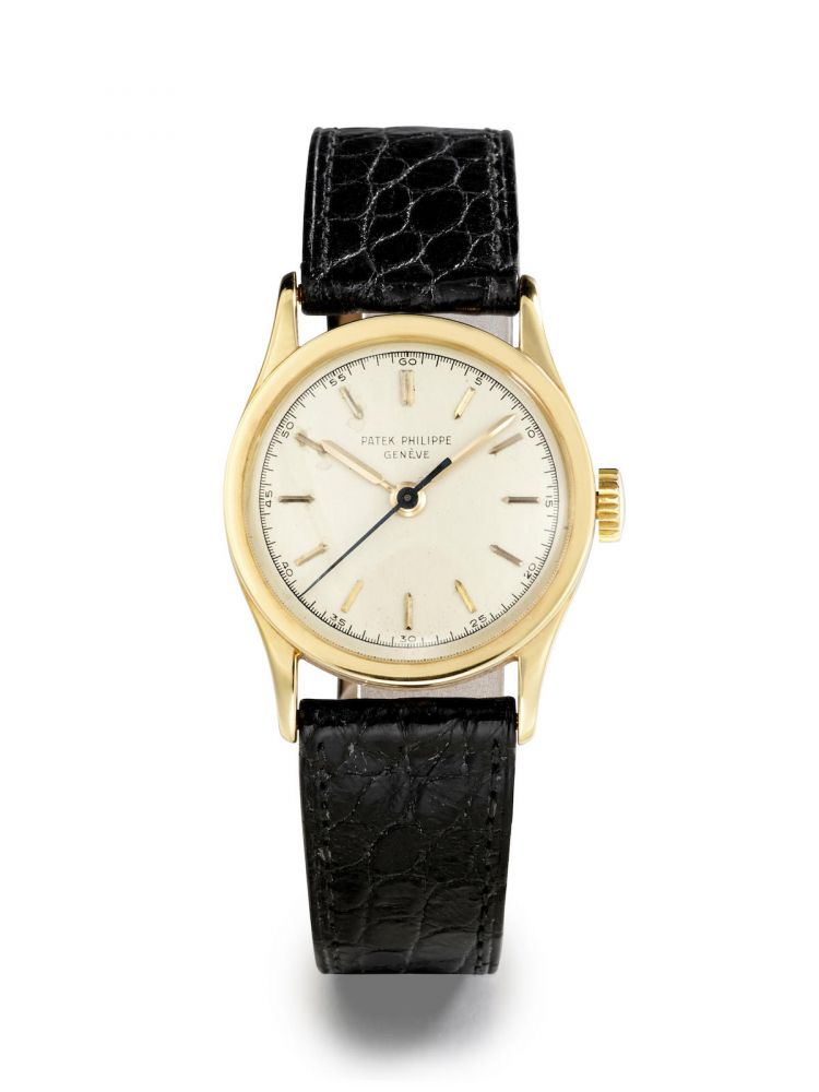 PATEK PHILIPPE | REF. 2457 CALATRAVA, A FINE YELLOW GOLD WRISTWATCH, circa 1954