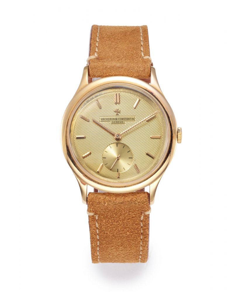 VACHERON CONSTANTIN. A RARE OVERSIZED PINK GOLD WRISTWATCH WITH CHAMPAGNE GILT TEXTURED DIAL, CIRCA 1955