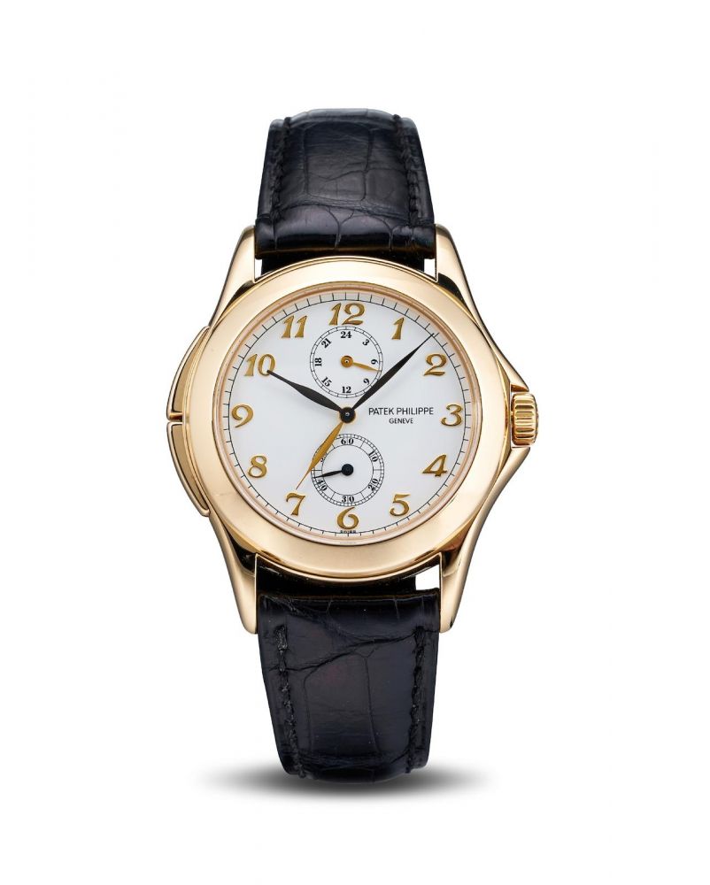 PATEK PHILIPPE | Ref.5134J A FINE YELLOW GOLD DUAL TIME WRISTWATCH with 24 hours indication, circa 2004