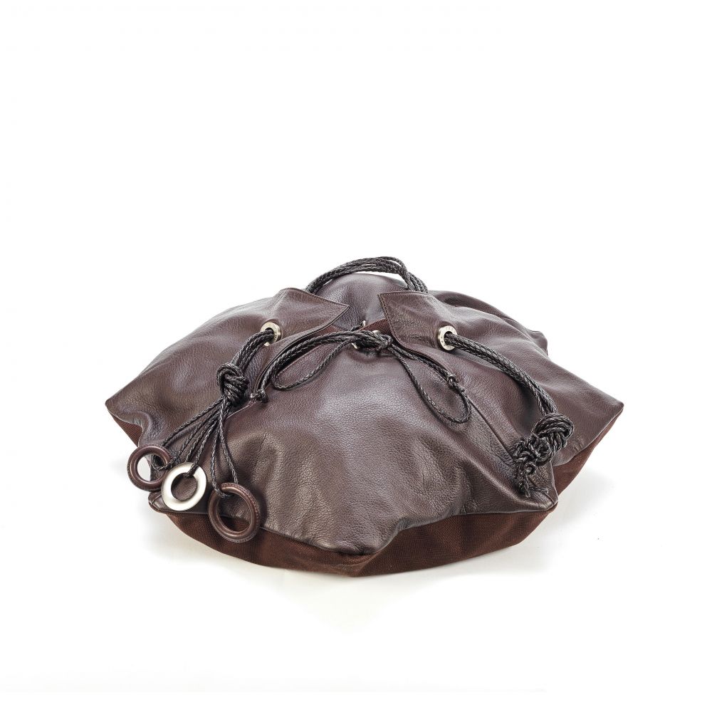 A BROWN LEATHER AND COTTON ORAGAMI BAG