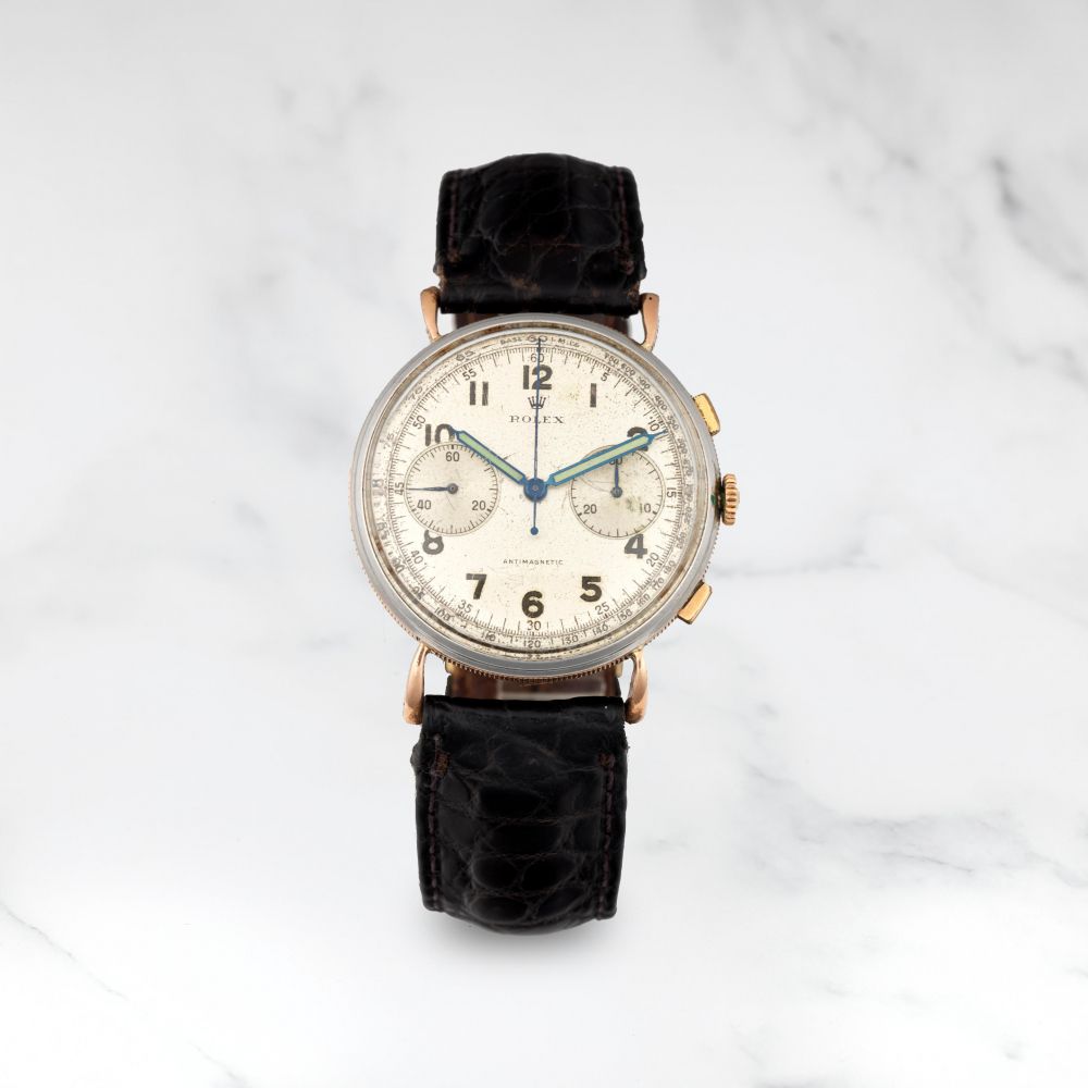 ROLEX. RARE CHRONOGRAPHE BRACELET EN METAL DORE ET ACIER MOUVEMENT MECANIQUE