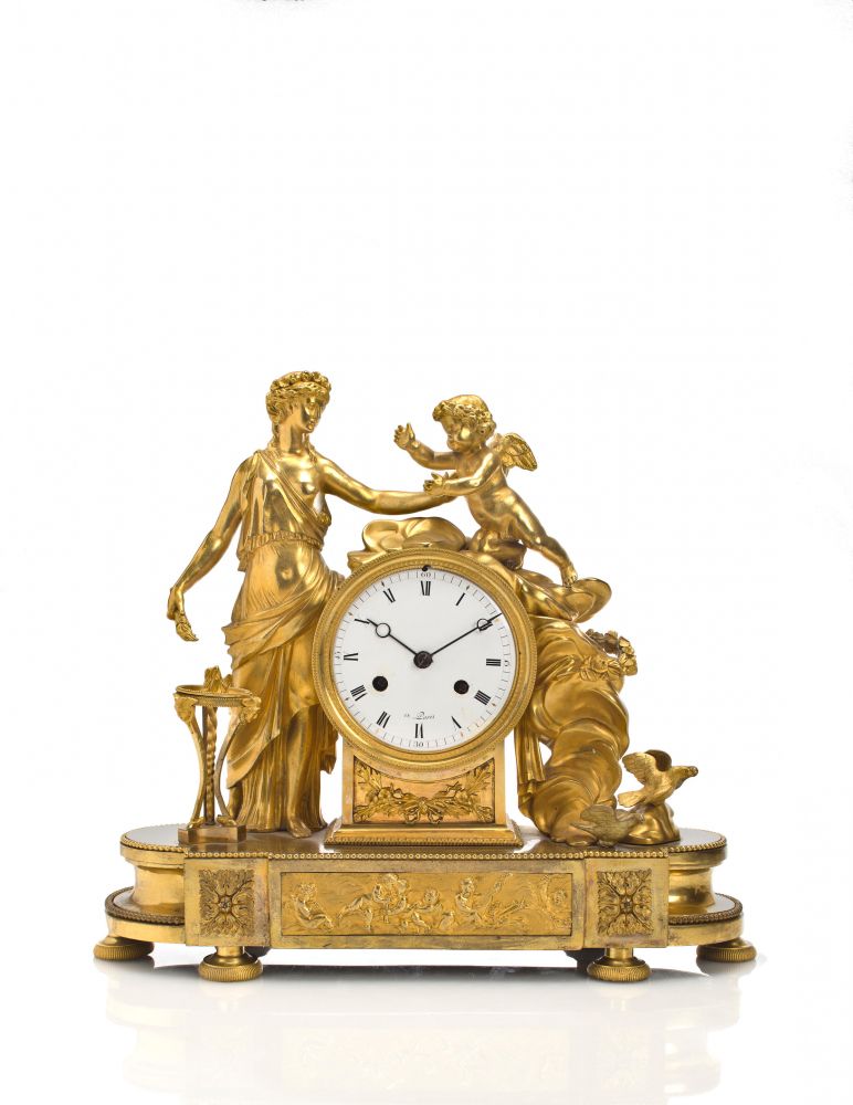 A LATE LOUIS XVI GILT BRONZE MANTEL CLOCK