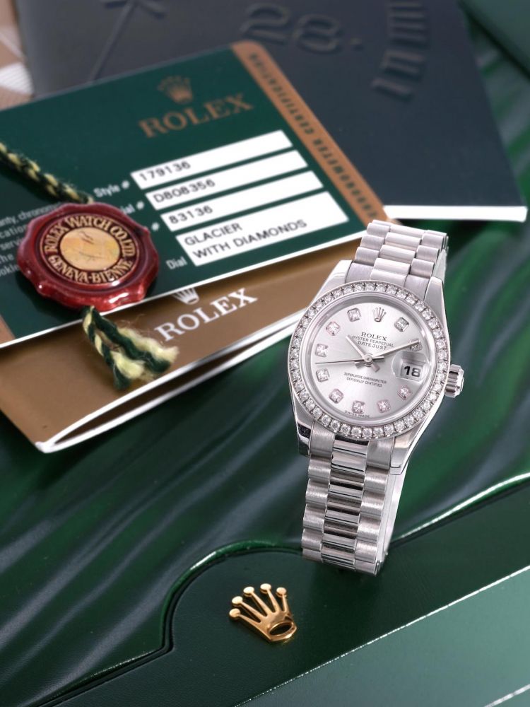 ROLEX | DATEJUST REF. 179136, A FINE LADY'S PLATINUM AND DIAMOND BRACELET WATCH WITH DATE, 2011