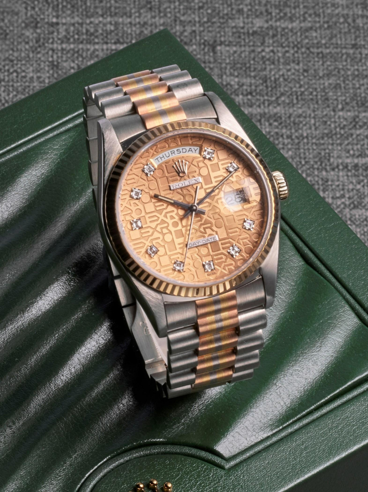ROLEX | DAY-DATE "TRIDOR", REF.18239, A WHITE, PINK AND YELLOW GOLD BRACELET WATCH WITH DAY, DATE AND DIAMOND-SET INDEXES, CIRCA 1990