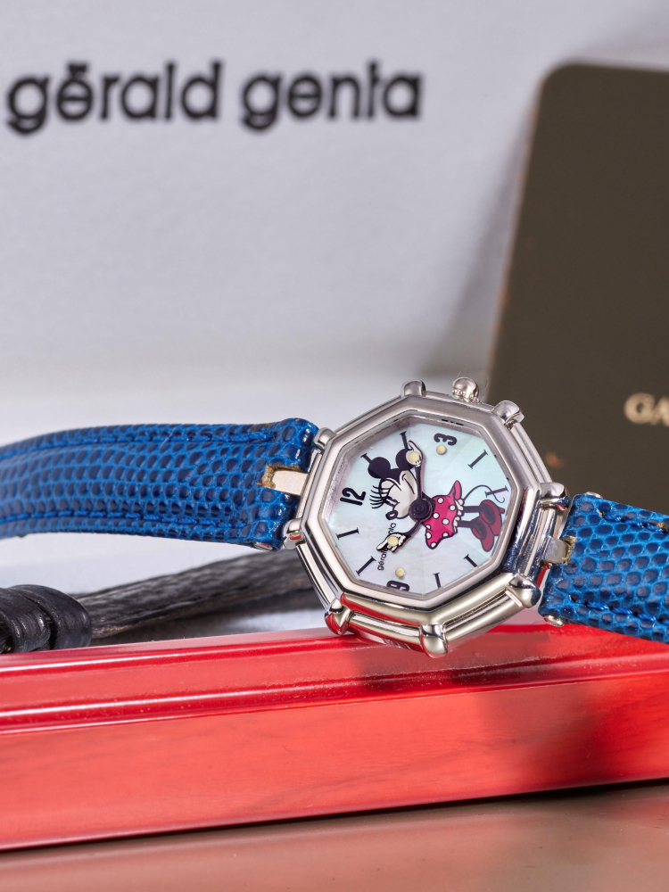 GÉRALD GENTA | DISNEY - MINNIE MOUSE, REF.G3499.7, A STAINLESS STEEL WRISTWATCH WITH MOTHER-OF-PEARL DIAL, CIRCA 1998
