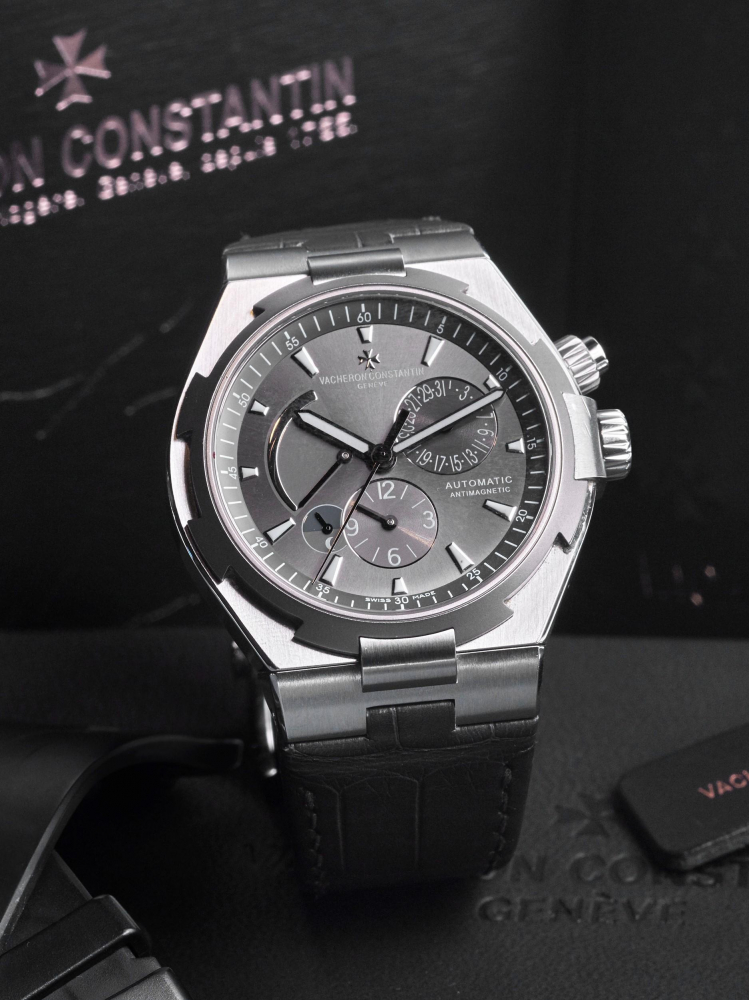 VACHERON CONSTANTIN | OVERSEAS, REF.47450, A STAINLESS STEEL AND TITANIUM DUAL TIME WRISTWATCH WITH DATE, POWER RESERVE AND DAY/NIGHT INDICATIONS, CIRCA 2011